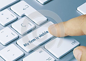 My firm is viable - Inscription on Blue Keyboard Key