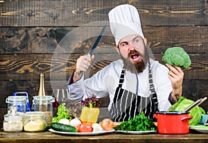 My kitchen my rules. Man bearded hipster cooking fresh vegetables. Freshest possible ingredients. Chef use fresh organic