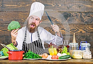 My kitchen my rules. Man bearded hipster cooking fresh vegetables. Freshest possible ingredients. Chef use fresh organic