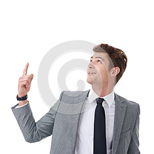 On my way to the top. A handsome young businessman isolated on white.