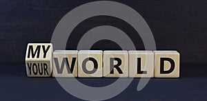 My or your world symbol. Turned wooden cubes and changed concept words Your world to My world. Beautiful black table black