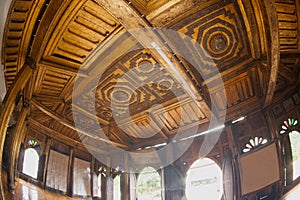 Myanmar art on ceiling at wood Church of Nyan Shwe Kgua temple.