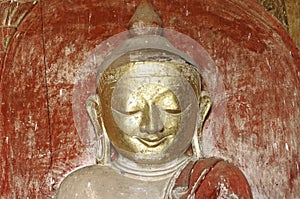 Myanmar, Bagan: statue inside a temple photo