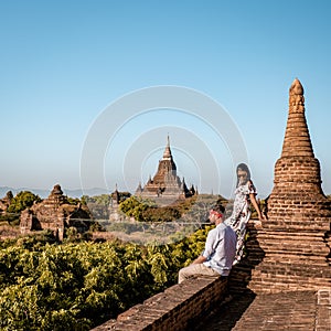 Myanmar, couple sunrise Bagan, men woman sunset Bagan .old city of Bagan Myanmar, Pagan Burma Asia old ruins Pagodas and