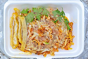 Myanmar traditional or classic white flat noodle salad called Khauk Swe Thoke