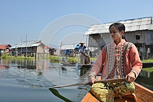 Myanmar Wooden Sampan canoe in channel