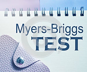 Myers-Briggs test typed on notebook page. Psychological test business concept