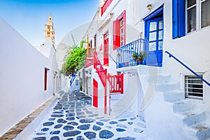 Mykonos, Greece - Cobblestone alley whitewashed village Cyclades Islands