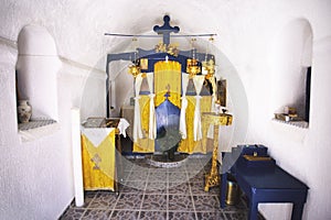 MYKONOS, GREECE - Jun 27, 2017: Inside of a small orthodox church on Mykonos island