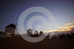 Mykonos, Greece, 11 September 2018, Evening view awaiting the sunset on the windmill hill