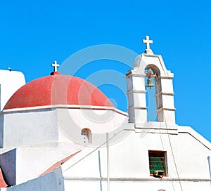 mykonos old architecture white background cross in santo