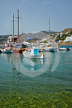 Mykonos port with fishing boats and yachts and vessels, Greece