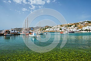 Mykonos port with fishing boats and yachts and vessels, Greece