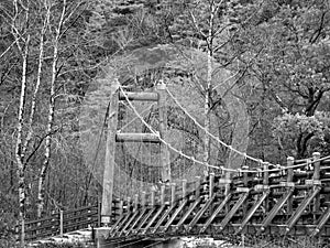 Myojin bridge and Azusa river in late autumn at Kamikochi National Park, Matsumoto, Nagano, Japan