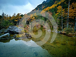 Myojin pond at Hotaka Rear shrine in Kamikochi, Nagano, Japan