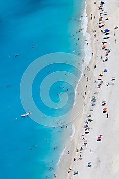 Myrtos beach with people, Kefalonia island, Greece photo