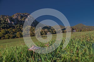 Mysiaca diera hill and rocks over Podskalie village in autumn evening