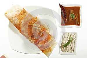 Mysore Masala Dosa Stuffed With potato Masala, Chutney And Sambhar photo