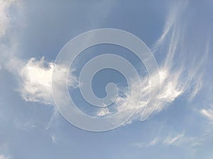 A Mysterious angel wing shape visible in the form of cirrus clouds