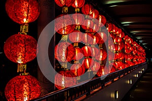 Mysterious ball-shaped lights hang and light along the length of the corridor, Singapore