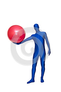 Mysterious blue man in blue suit exercise with pilates ball