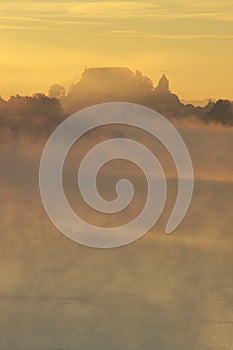 Mysterious Castle In Foggy Autumn