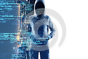 Mysterious cyber hacker with obscured face standing before a screen with futuristic blue digital code signifying cybercrime and