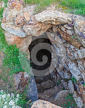 mysterious entrance to an underground dungeon