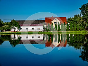 Mysterious house reflected in water