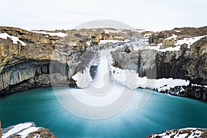 Mysterious huge waterfall among mountain