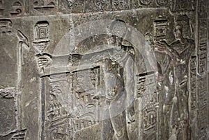 Mysterious murals on the walls of the Temple of Dendera Hathor , near the city of Ken