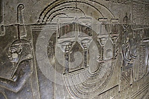 Mysterious murals on the walls of the Temple of Dendera Hathor , near the city of Ken