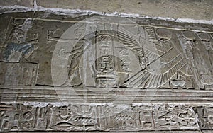 Mysterious murals on the walls of the Temple of Dendera Hathor , near the city of Ken photo
