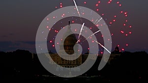 Mysterious night sky with full moon United States Capitol Building in Washington DC with Fireworks Background For 4th of