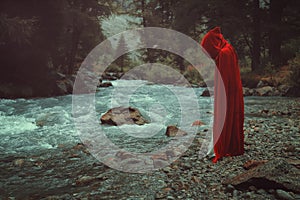 Mysterious red cloaked figure photo