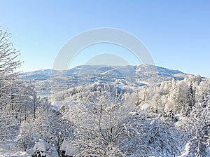 Mysterious winter landscape majestic mountains in winter. Magical winter snow covered tree. Winter road in the mountains. In antic