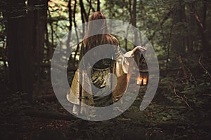 Mysterious woman in fairy forest