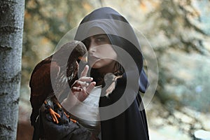 Mysterious woman with hawk