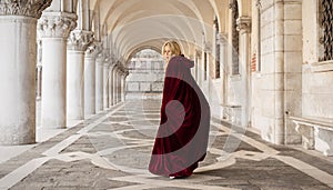 Mysterious woman in red cloak photo