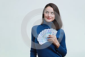 A mysterious young woman with Qazakhstan money tenge