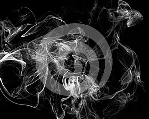 Mystery dense smoke over black background, abstract photo