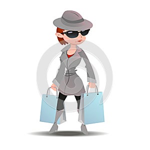 Mystery shopper woman in spy coat with shopping paper bags