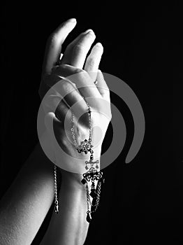 Mystic black & white female hand with gothic chain