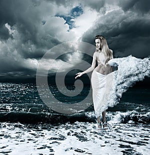 Mystic Goddess in Stormy Sea photo
