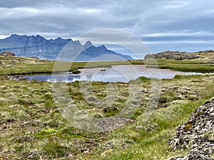 Mystic Landscape with a Lake and Mountains in Iceland