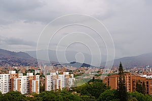 Mystic Rainy Day: Hill 'Cerro El Volador' Enshrouded in Gray Over Medellin, Colombia photo