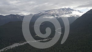 Mystic Veil: Mount Rainier Shrouded in Clouds