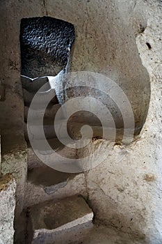 Mystic view of old stony ladder in the cave