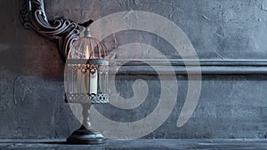 Mystical Halloween still-life background. Candlestick with candles, old fireplace. Horror and witchery.