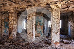 Mystical interior, ruins of an abandoned ruined building of house of culture, theater of USSR. Old destroyed walls, corridor with